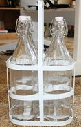  glasflasker med patentprop i metalstativ holder