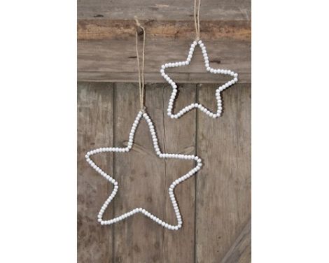 hvid stjerne i træperler.