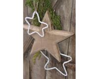 Trend foto af en hvid stjerne i træperler fra ib laursen