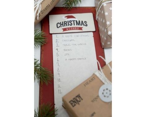 Et billede af et metalskilt som ønskeseddel