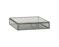 Et foto af en glaskasse med låg