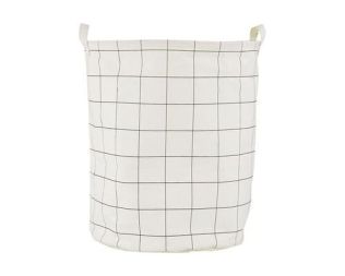 Et foto af en vasketøjspose house doctor med tern i stof