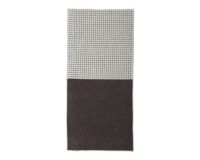 Et foto af et gråt badehåndklæde med tern fra Mette Ditmer i serien One