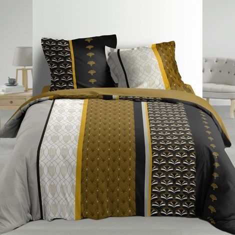 Dobbelt dynebetræk med striber og mønster redt op på dobbeltdynen