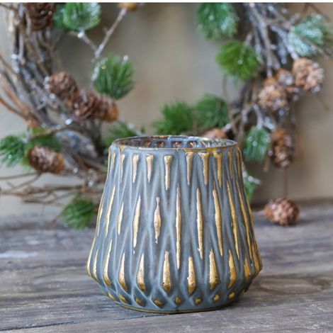 Potteskjuler rustik med guld i glas kan bruges som fyrfadsstage