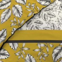 Nærbillede af gult sengetøj 140x200 i bomuld