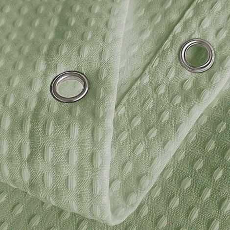 Nærbilled af metal øjer i rustfrit stål på badeforhæng ensfarvet grønt med ekstra længde