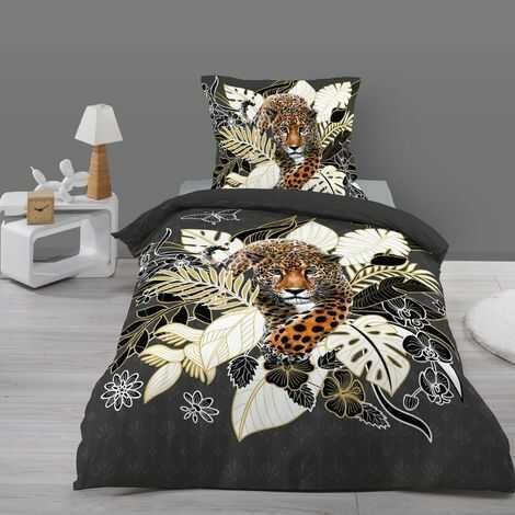 Sengetøj med leopard print redt op på en enkeltseng