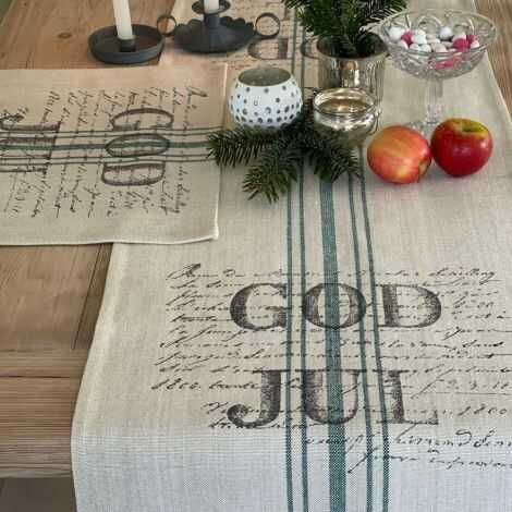 Juleløbere beige lagt på bordet med juledækkeservietter  i samme design