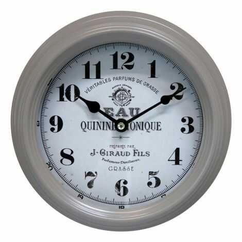 Vægur med tal latte farvet ramme i metal selve uret er hvidt med sorte tal Ø 22 cm