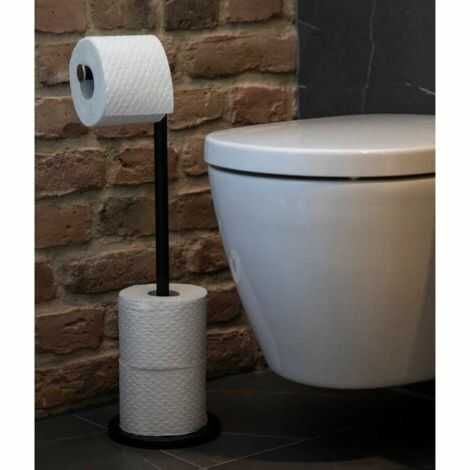 fritstående toiletrulleholder sort stående på badeværelsesgulvet med toiletpapir