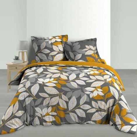 Sengetøj med blade lagt på dobbeltsengen sættet er i grå, beige, hvide og karry gule farver