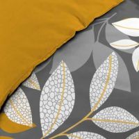 Nærbillede af blade mønsteret på sengesættet i king size