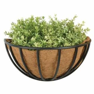 Blomsterkurv til væg med grønne planter