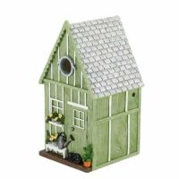 Blåmejse fuglehus designet som et haveskur