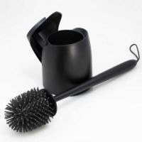 Toiletbørste silikone i plast med låg der lukker automatisk og udskifteligt børstehoved i silikone